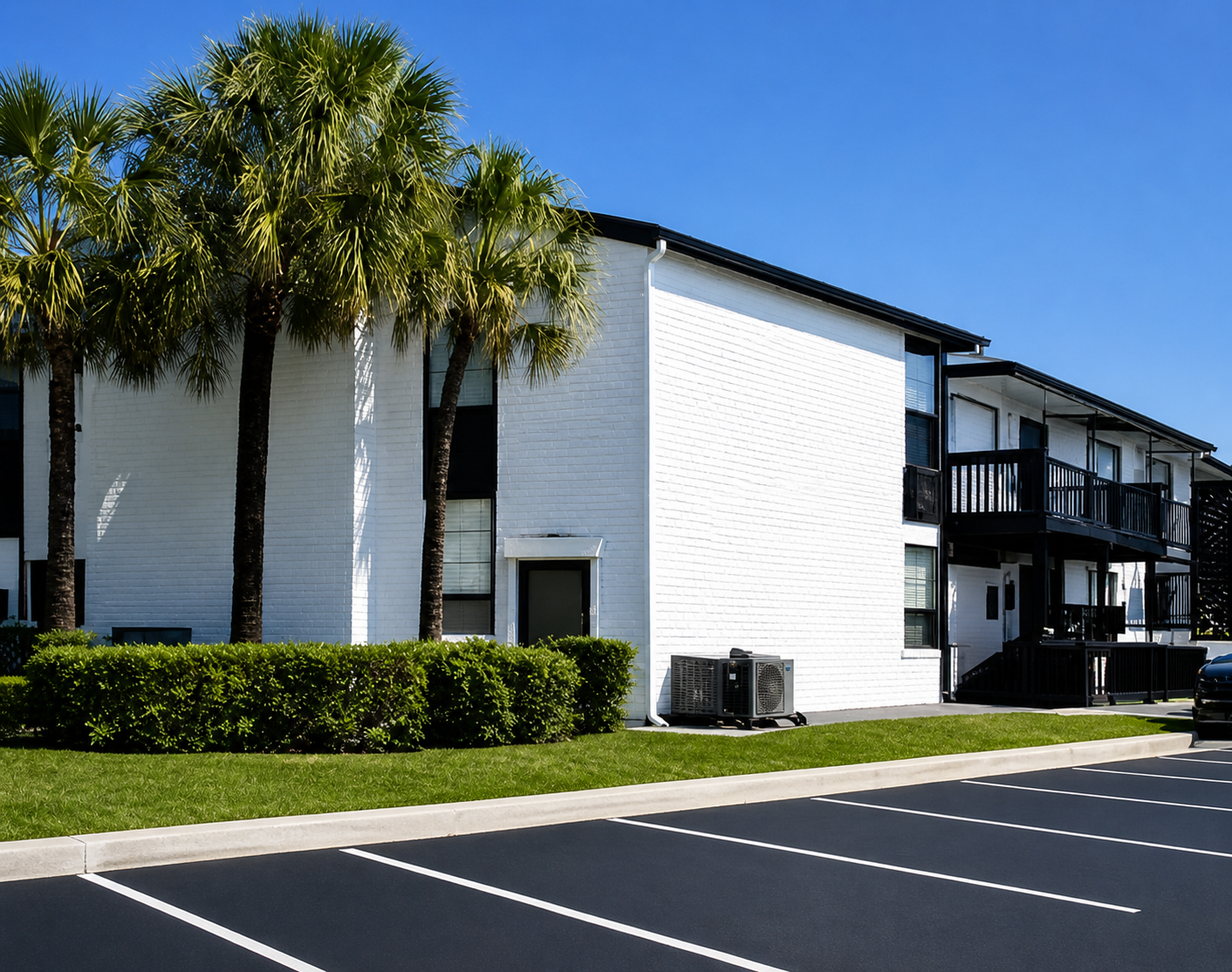 Renovated 39 Acres buildings with white exterior and black trim